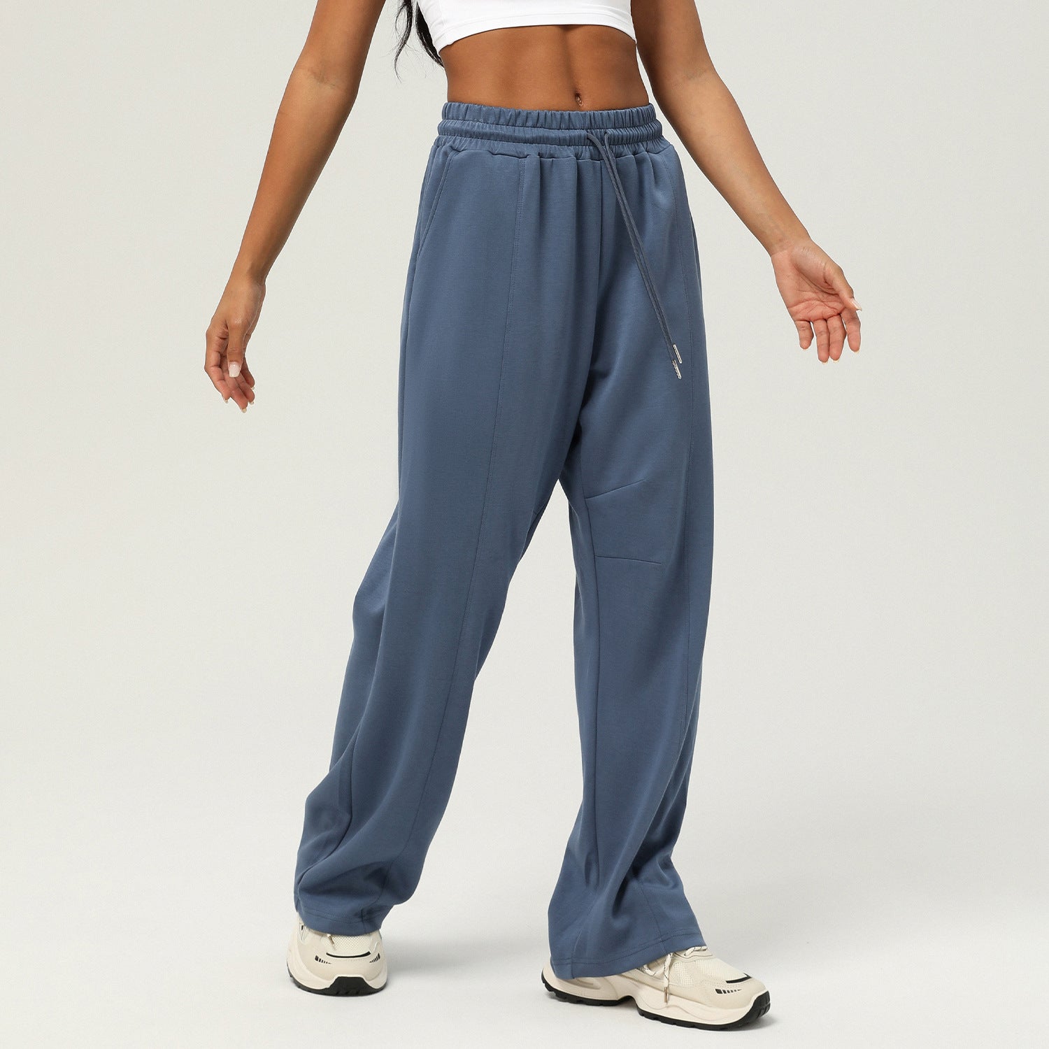 Blue-gray loose-fitting sweatpants with elastic waistband for casual fitness fashion ملابس