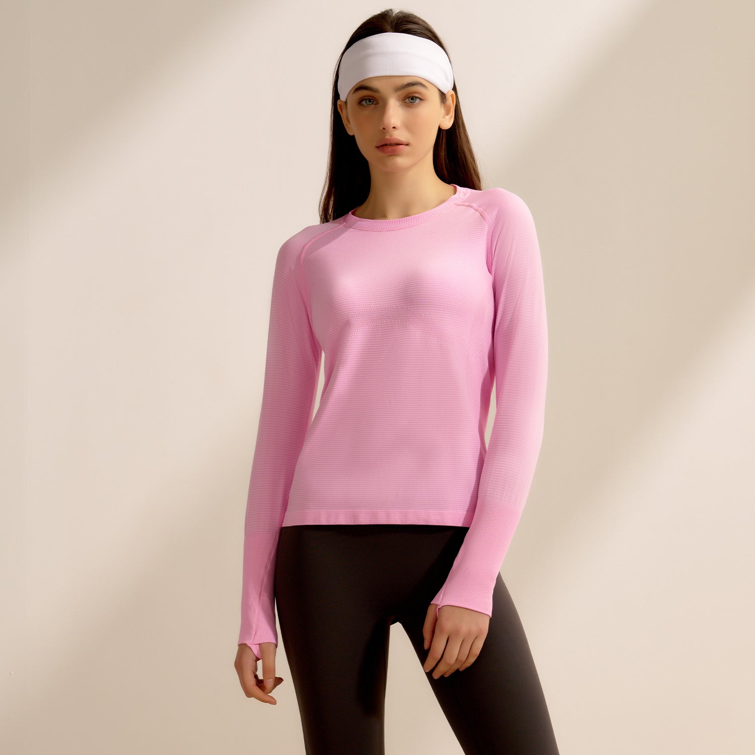 Pink long-sleeved athletic top for running fitness, stylish ملابس for active fashion