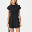 Black polo-style mini dress with short sleeves, perfect for active fashion enthusiasts