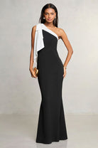 Elegant black and white evening gown showcasing stunning fashion in ملابس design