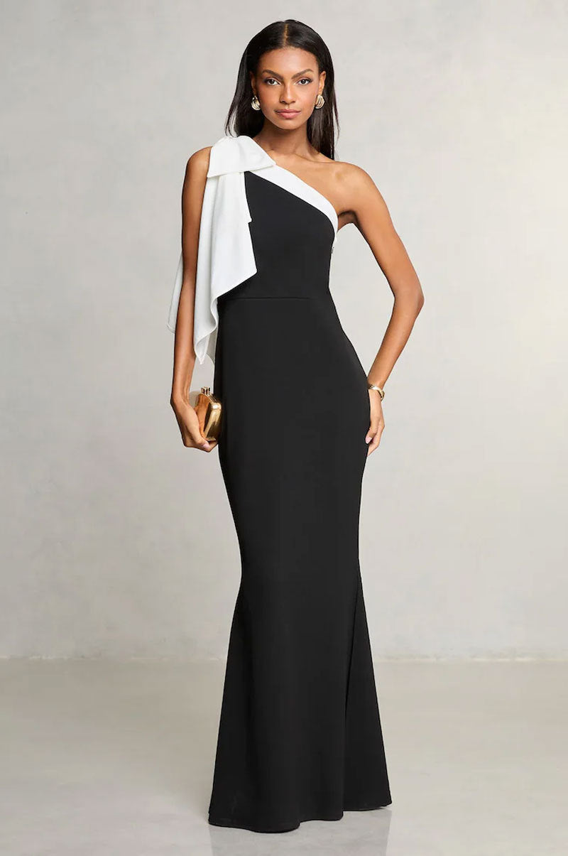 Elegant black and white evening gown showcasing stunning fashion in ملابس design