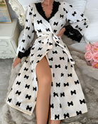 White wrap dress with black bow print and lace trim from Velvet Lace Cardigan Pajamas