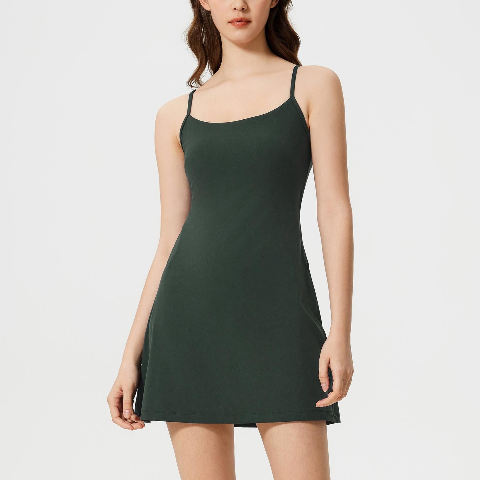 Dark green spaghetti-strap mini dress with fitted silhouette for stylish fitness fashion