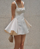 White square-neck mini dress from Beautiful Tight Waist a Swing Sling Dress fashion collection