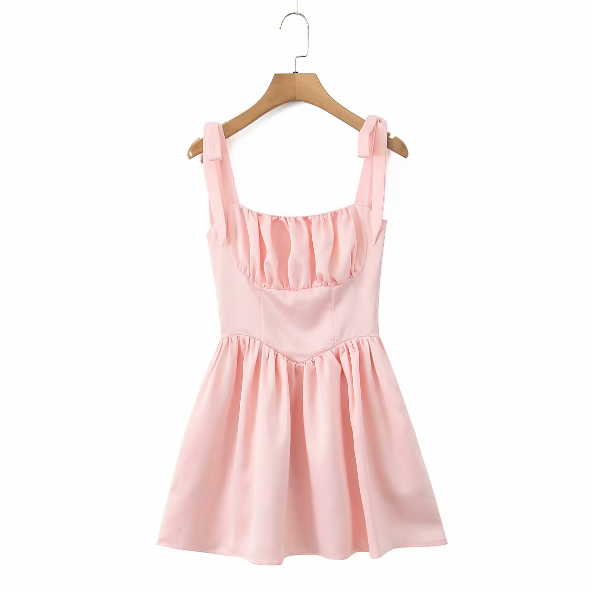 Pink mini dress with tie straps, perfect for a fashionable evening look in ملابس