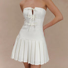 White strapless mini dress with pleated skirt from Enchanting A Line Pleated Dress fashion collection