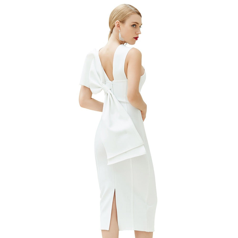 White TIGHT STRAPPY BOW MIDI DRESS featuring an oversized bow and sexy strappy design