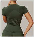 Olive green athletic top from Thread Seamless Short Sleeved T-shirt Yoga for stylish fitness ملابس