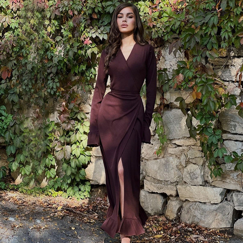 Long-sleeved burgundy wrap dress with side slit and ruffled hem for elegant fashion ملابس