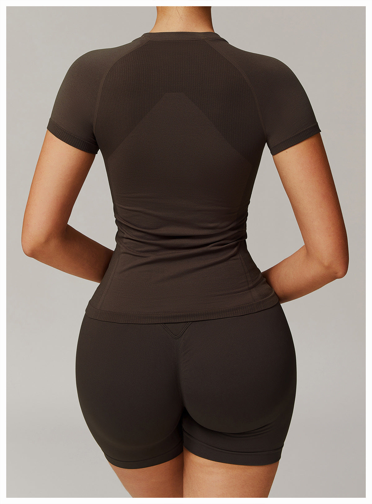 Dark brown athletic set featuring Thread Seamless Short Sleeved T Shirt for yoga fashion