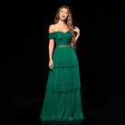 Elegant green off-the-shoulder gown from Gorgeous Design, a perfect fashion choice