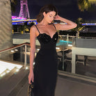 Elegant black evening gown with sweetheart neckline, ideal for luxury fashion events