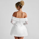 White off-shoulder mini dress with lace sleeves, showcasing elegant A line dress style