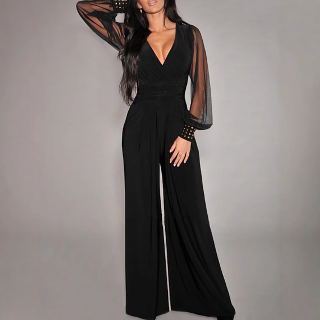 Black wide-leg jumpsuit with sheer sleeves and embellished cuffs, perfect for elegant fashion ملابس