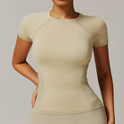 Beige fitted short-sleeve top from Thread Seamless for yoga and stylish casual fashion