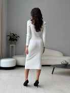 White ribbed knit dress displayed as part of Gorgeous Knitted Dress fashion collection