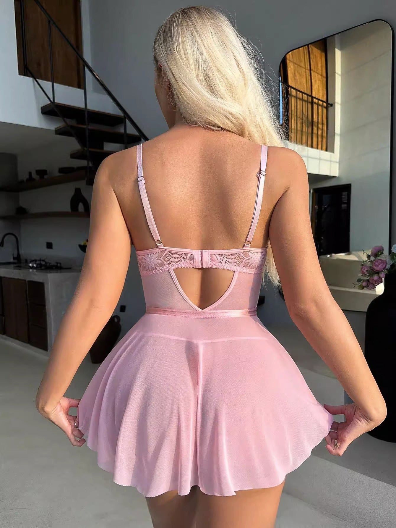 Pink flared dress with lace back detail, perfect for stylish lingerie fashion ملابس