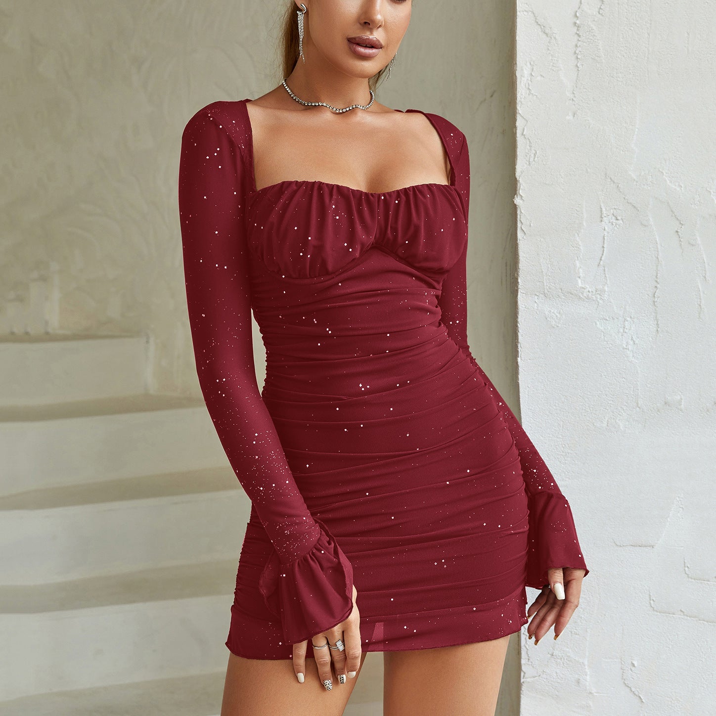 Burgundy bodycon dress with sparkles, bell sleeves, and sweetheart neckline for elegant fashion