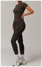 Form-fitting brown top and leggings for stylish yoga and activewear fashion