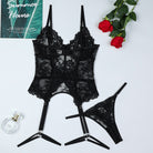 Black lace lingerie set featuring corset top, garter straps, and matching thong for fashion ملابس