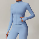 Light blue Langry fitted athletic jacket and leggings for stylish yoga and sports fashion