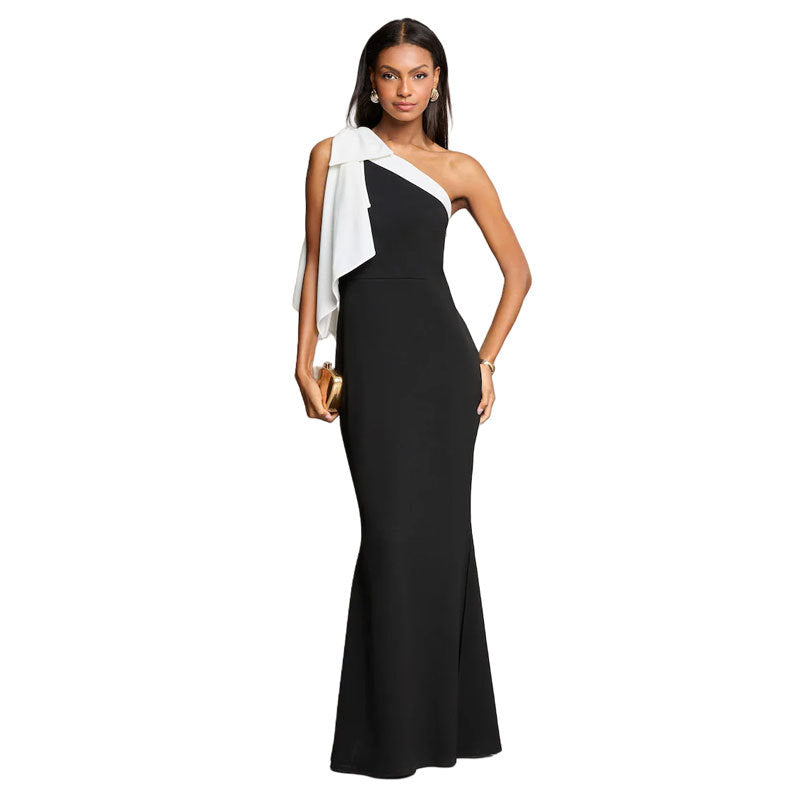 Elegant one-shoulder black evening gown with white accent draping for stunning fashion ملابس