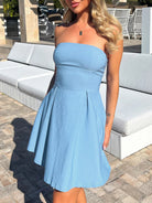 Light blue strapless dress with pleated skirt, a trendy choice for ملابس and fashion lovers