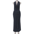 Sleeveless draped gown with tie, ideal for fashion enthusiasts seeking elegant ملابس