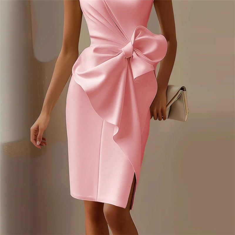 Pink satin dress with oversized bow, perfect for elegant fashion and ملابس occasions