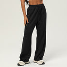 Black wide-leg sweatpants with elastic waistband, ideal for Casual Fitness Yoga Pants fashion