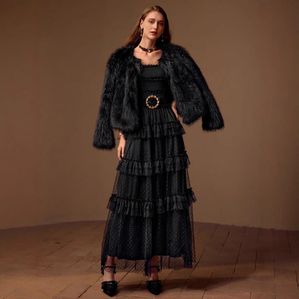 Black tiered maxi dress with ruffles and matching faux fur jacket for elegant fashion ملابس