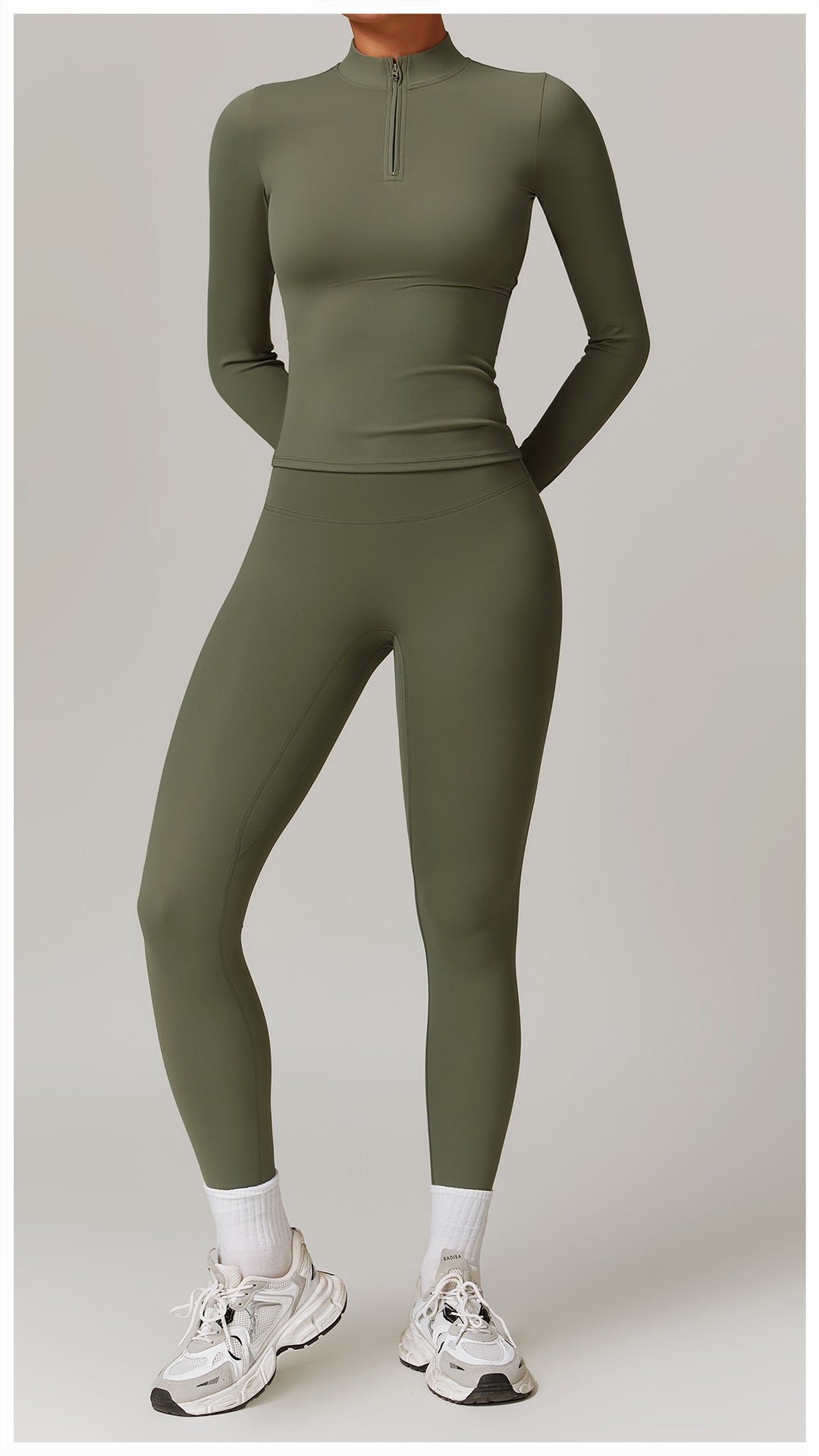 Olive green langry athletic bodysuit for outdoor running sports fitness with white sneakers