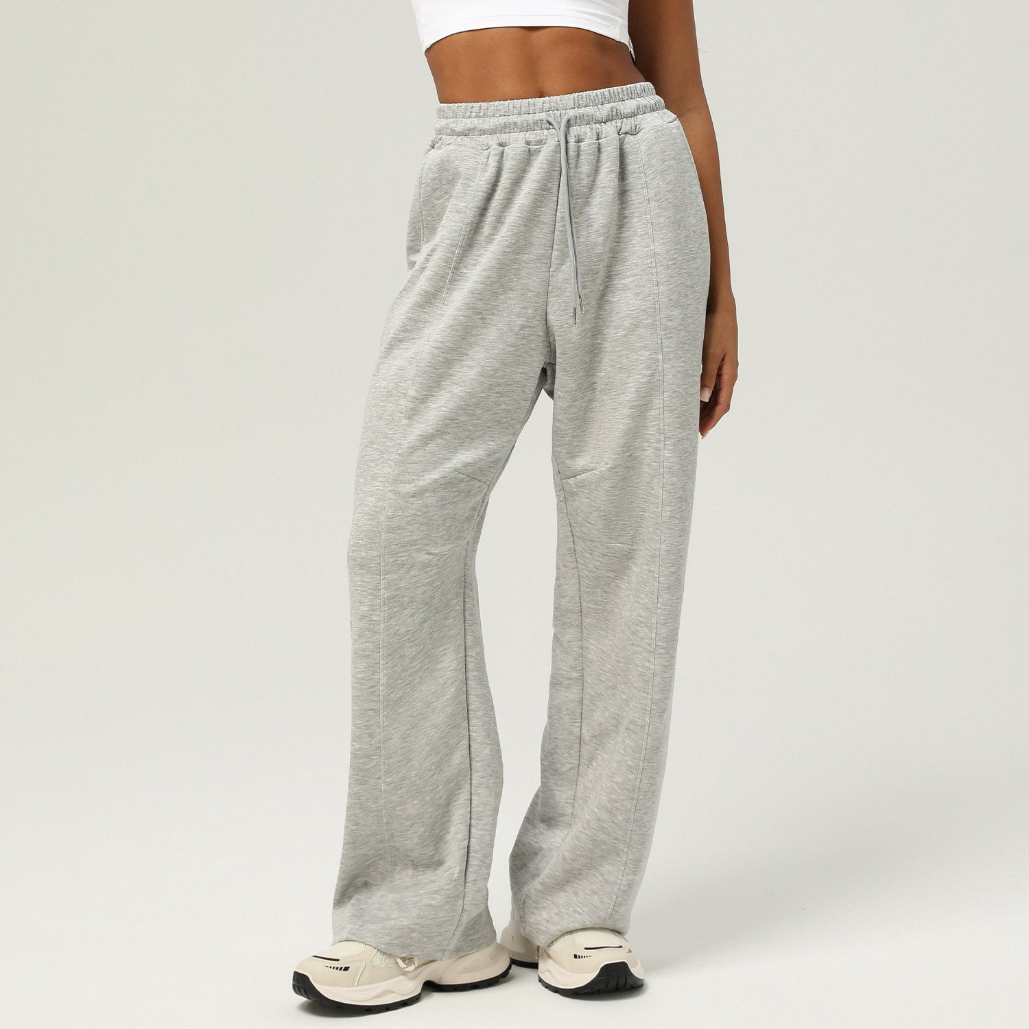 Light gray langry sweatpants with a relaxed wide-leg fit for casual fitness and fashion