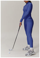 Golfer in blue athletic outfit with gray sneakers showcasing Langry fashion ملابس style