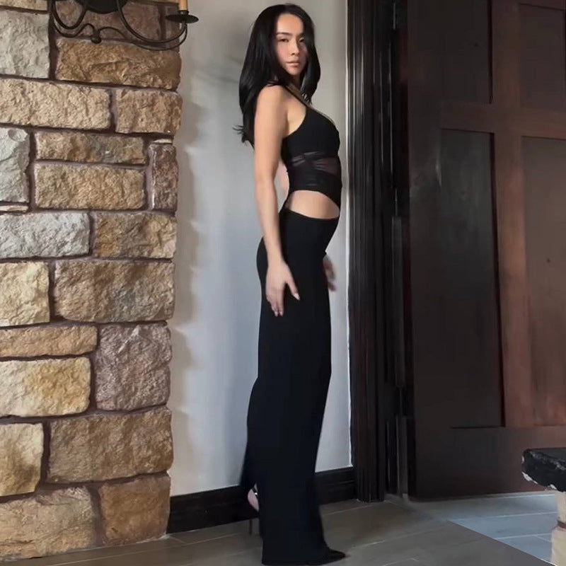 Person in black crop top and high-waisted pants showcasing elegant langry fashion