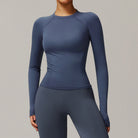 Blue long sleeve athletic top and leggings for stylish running fashion