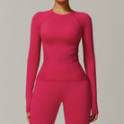 Matching pink athletic set featuring a long sleeve running sport top for stylish fitness fashion