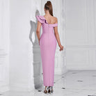 Pink one-shoulder evening gown with ruffled detail and side slit for fashion enthusiasts