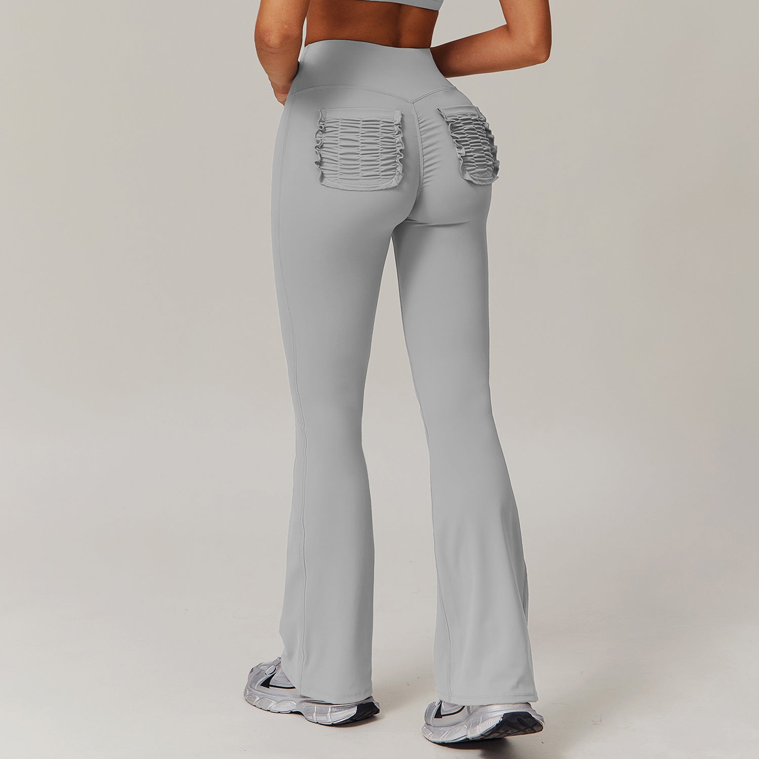 Gray flared leggings with ruched back pockets for stylish casual sports trousers in fashion