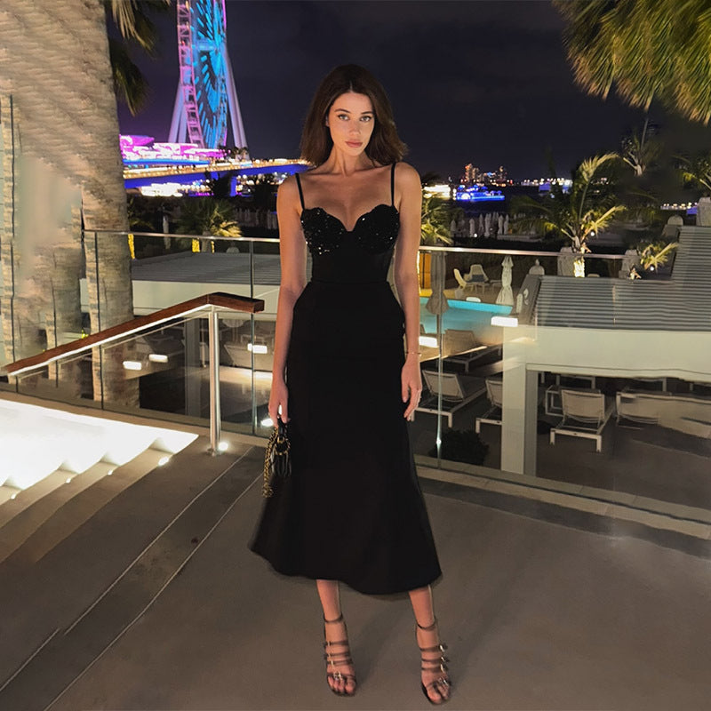 Elegant black midi dress with mesh neckline for luxury evening fashion ملابس