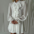 White ruffled blouse and skirt set from French Elegant Short Dress in stylish fashion