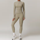 Beige long-sleeved athletic bodysuit with leggings and sneakers for outdoor running ملابس