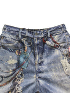 Distressed blue denim jeans with paint splatters and chains for trendy casual fashion