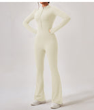 Cream-colored zip-front jumpsuit with flared legs, perfect for casual fashion ملابس