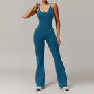 Blue flared jumpsuit with white trim, perfect for fashion-forward activewear enthusiasts