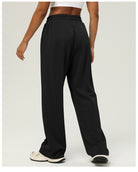 Black wide-leg sweatpants with elastic waistband, perfect for casual fitness and fashion