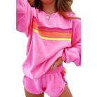 Pink sweatshirt and shorts set with retro rainbow stripes for casual fashion by Langry