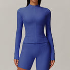 Blue ribbed langry two-piece athletic set featuring zip-up long sleeve top and shorts