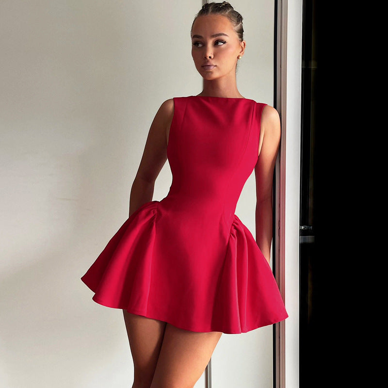 Sleeveless red fit-and-flare mini dress featuring a pleated skirt for stylish fashion