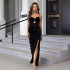 Sparkly black evening gown with cutout details, thigh-high slit for elegant fashion